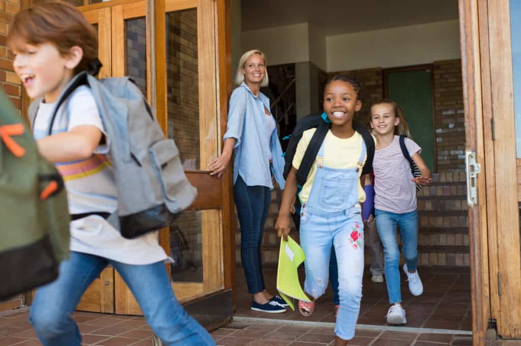 photo of children coming out of school