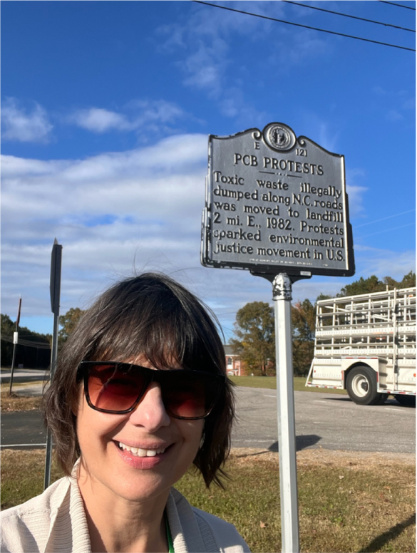 WHE Executive Director Michelle Naccarati-Chapkis at the landmark for the PCB Protests